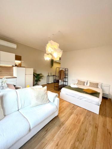 Giường trong phòng chung tại MiA MARiA MARGAUX