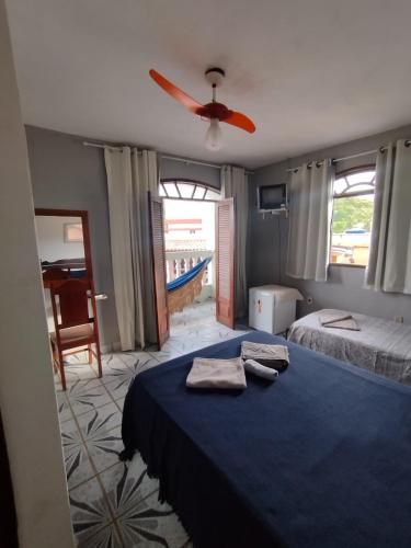 Giường trong phòng chung tại Pousada do Nilo