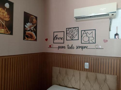 Un ou plusieurs lits dans un hébergement de l'établissement Aracaju Suite - Seu Conforto no Coração da Capital