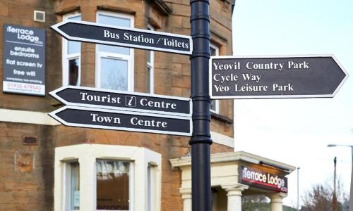 Et logo, certifikat, skilt eller en pris der bliver vist frem på The Terrace Lodge Hotel