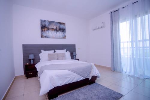 Katil atau katil-katil dalam bilik di Appartement RUBIS