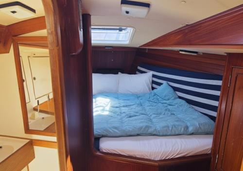 En eller flere senge i et værelse på Day Use Veleiro Catavento em Paraty