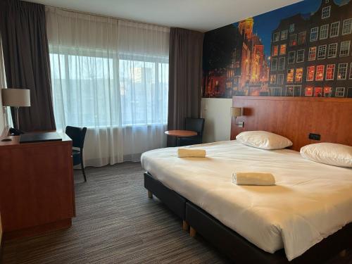 Ένα ή περισσότερα κρεβάτια σε δωμάτιο στο Westlake Hotels Amsterdam