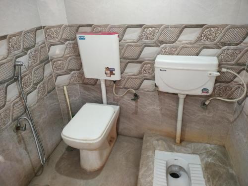 Ένα μπάνιο στο Kushwaha Home Stay