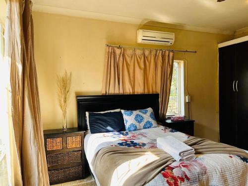 Postel nebo postele na pokoji v ubytování Bird & Bed Farmhouse