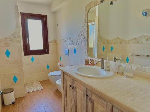 Phòng tắm tại Villa Titimbaru