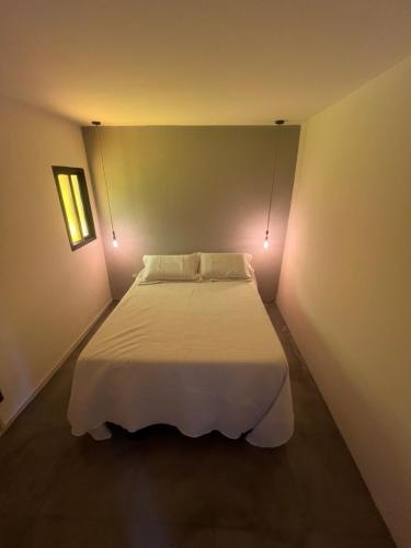 En eller flere senge i et værelse på Quinta Lincoln