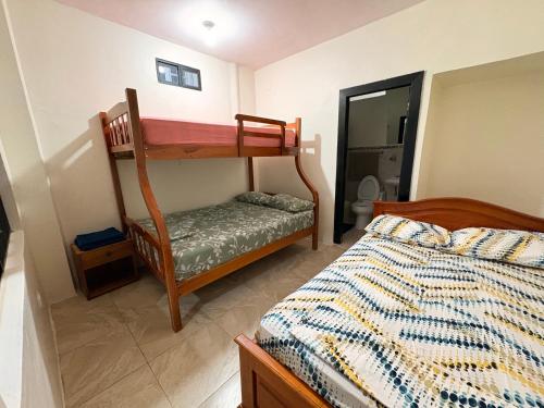 En eller flere senge i et værelse på Apartamento JAGA