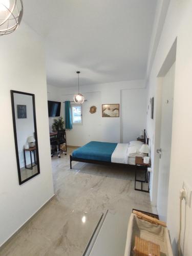 Postel nebo postele na pokoji v ubytování Nympes Melody - Golden Harmony Stay