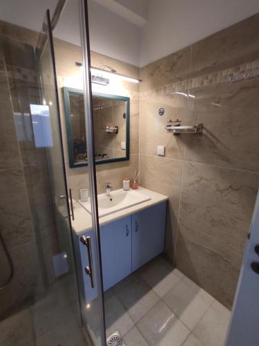 Koupelna v ubytování Nympes Melody - Golden Harmony Stay