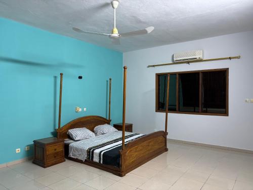 En eller flere senge i et værelse på Villa Serenity Garden Ouidah