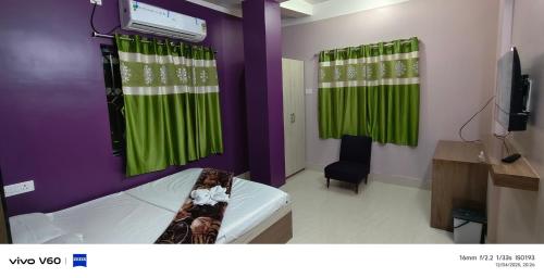 TV a/nebo společenská místnost v ubytování Prime Inn Guest House