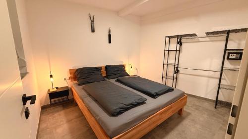 a bedroom with a bed in a room at Apart Schwalbennest in Imst