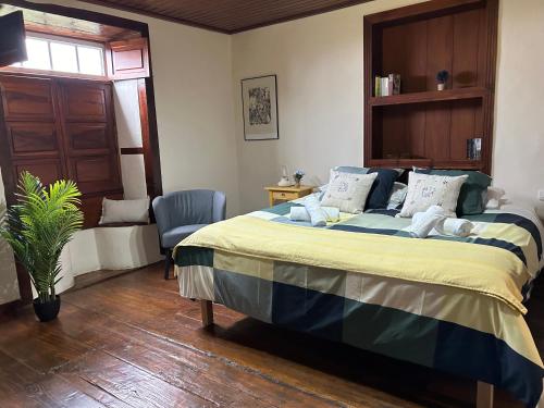 En eller flere senge i et værelse på Casa Antonio Taño