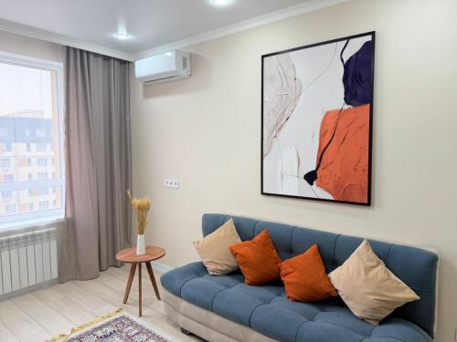 Khu vực ghế ngồi tại Almaty Aspan Comfort Apartment