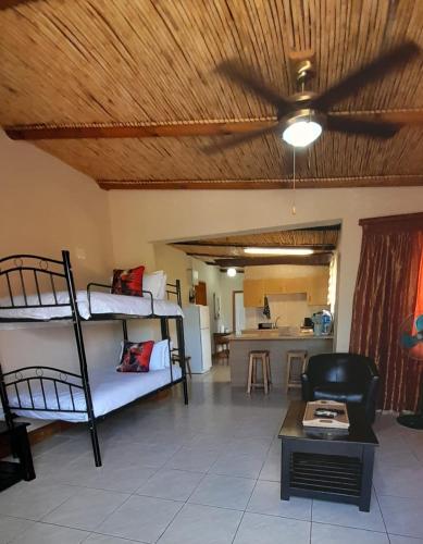 Postel nebo postele na pokoji v ubytování Nagenoeg Guest House