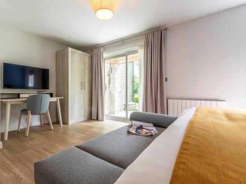 En eller flere senge i et værelse på 2 Bed in Saltash oc-87703