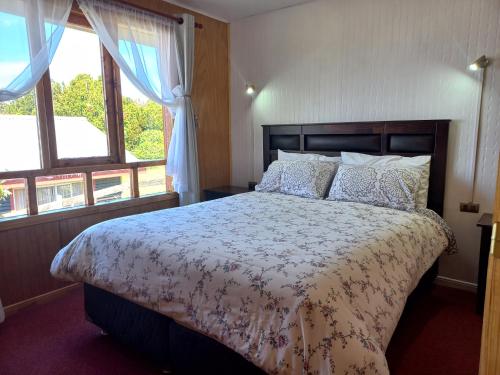 Postel nebo postele na pokoji v ubytování Agroturismo Coñico