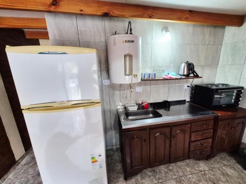 Cucina o angolo cottura di Cabañas La Carlota