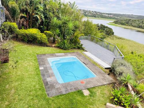 Swimmingpoolen hos eller tæt på Bonza Bay Bliss