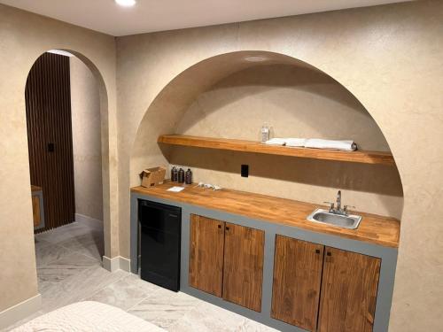 Kuchyň nebo kuchyňský kout v ubytování Presidio Inn