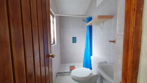 Et badeværelse på Parque Girasoles Balneario & Cabañas