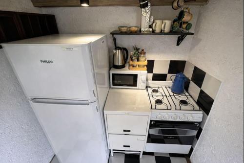 Køkken eller tekøkken på Apart Suite Rural, hidromasajes doble, pileta, Grupo Cabaña La Triada