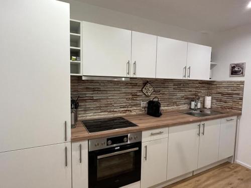 Køkken eller tekøkken på Frisch renovierte Privatunterkunft in Kulmbach