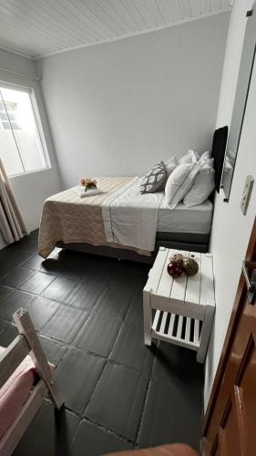 Postel nebo postele na pokoji v ubytování Pousada maré torres