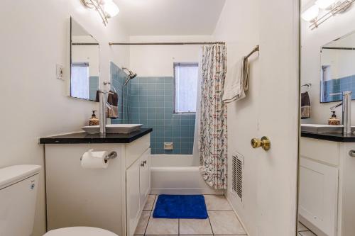 a bathroom with a toilet and a sink and a shower at Spacious Single Apt D In Santa Monica in Los Angeles