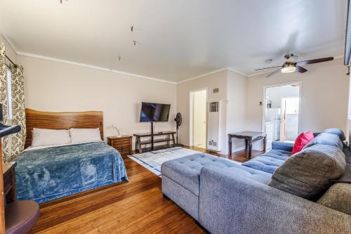 a living room with a couch and a bed at Spacious Single Apt D In Santa Monica in Los Angeles