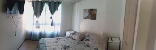 Postel nebo postele na pokoji v ubytování Lindos Departamentos amoblado en Santiago centro