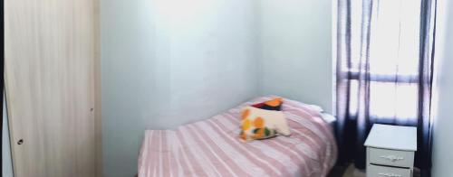 Postel nebo postele na pokoji v ubytování Lindos Departamentos amoblado en Santiago centro