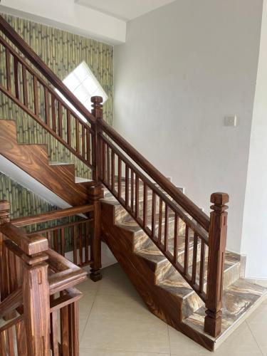 a wooden staircase in a house at Galle City Guest in Galle