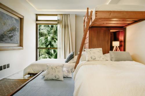 En eller flere senge i et værelse på Anera Villas