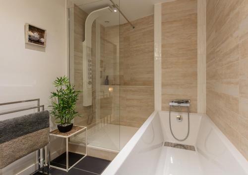 Koupelna v ubytování Le Victor Hugo Appartement T3 proche Musée Soulages