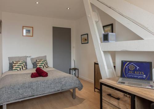 Postel nebo postele na pokoji v ubytování Le Victor Hugo Appartement T3 proche Musée Soulages