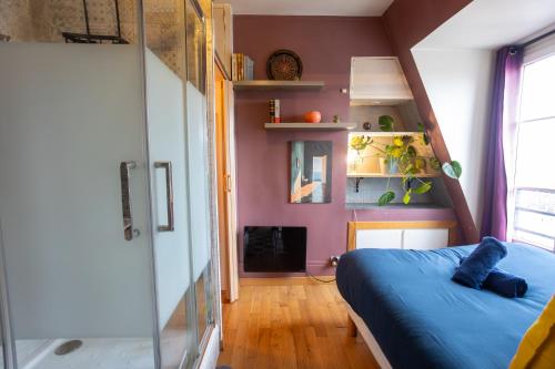 APPARTEMENT CHALEUREUX ARTISTIQUE QUARTIER GARE DU NORD - GARE DE L'EST et GRANDS BOULEVARDS