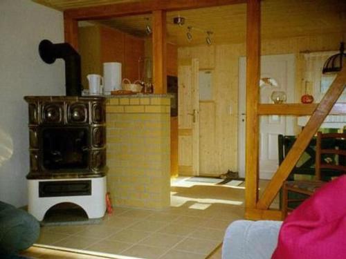 a kitchen with a stove in a room at Holiday Home mit Bergblick by Interhome in Ilfeld