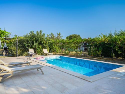 Apartment attraktive Wohnung mit privatem Pool by Interhome