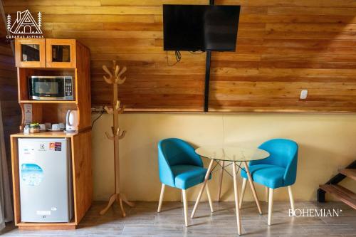 Et tv og/eller underholdning på Cabañas Alpinas en Oxapampa