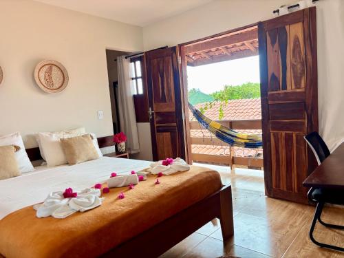 Ένα ή περισσότερα κρεβάτια σε δωμάτιο στο Morada das Dunas