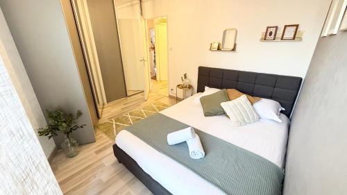 Postel nebo postele na pokoji v ubytování Appartement N1