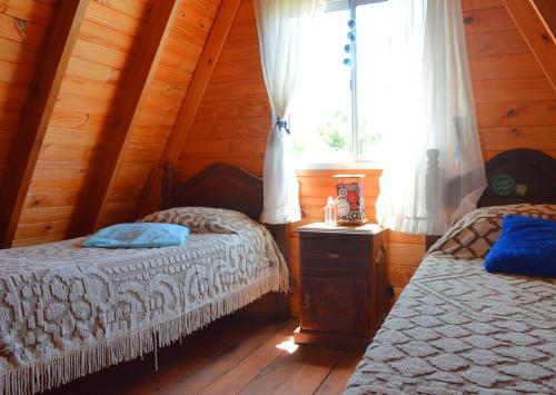 Postel nebo postele na pokoji v ubytování Alpino