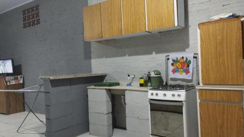 Køkken eller tekøkken på KitNet suíte Balneário shangrila