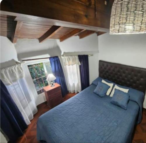 En eller flere senge i et værelse på Grace’s House, Ezeiza Airport