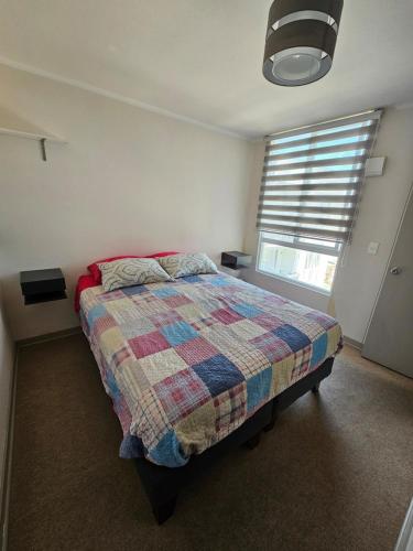 Postel nebo postele na pokoji v ubytování Cómodo departamento