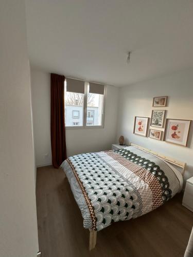 Postel nebo postele na pokoji v ubytování Appartement lumineux et calme Plage et commerces