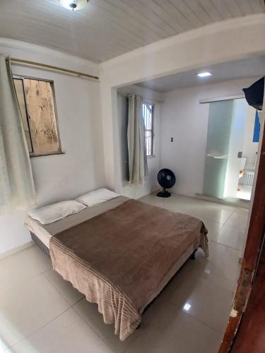 En eller flere senge i et værelse på Brisa Tropical