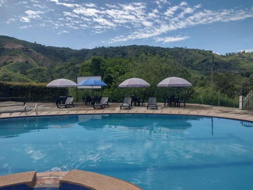 Φωτογραφία από το άλμπουμ του Finca Hotel Rancho Cattleya σε Estación El Salto